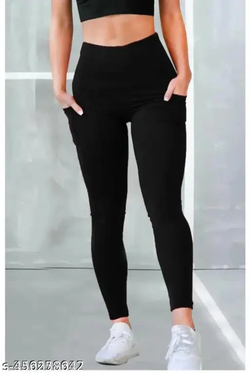 Stretchable lycra sports track pants in solid pattern, ideal for active women. Comfortable, breathable, moisture-wicking, with adjustable waistband - perfect for running, yoga, or gym workouts. Size 2834 inch. Made in India