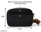 This is an image of a crossbody bag, which can also be used as a camera bag or a mini bag. It's designed without harmful chemical substances. The bag features a black leather texture with a gold zipper closure and has a dimension of approximately 15 cm in length. It is presented against a white background