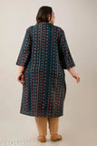 A woman in a plus-size, navy blue kurta with paisley print