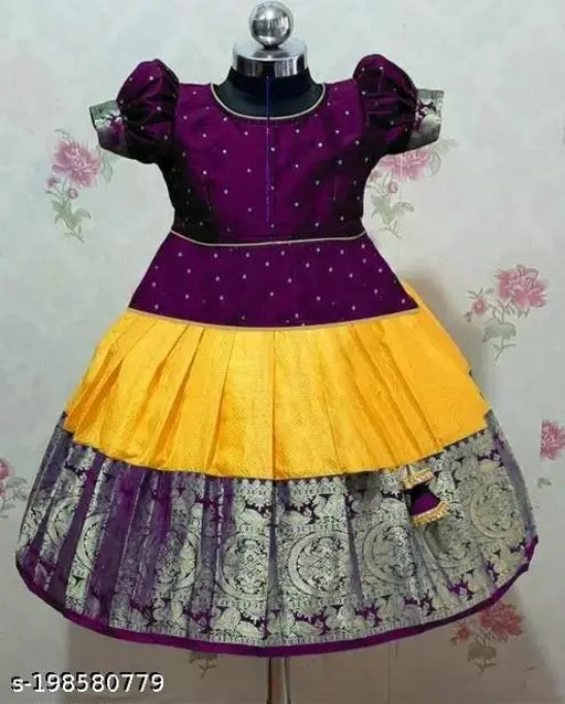 New fancy silk kids lehenga with jacquard pattern and short sleeves. Zari stitched net in sizes 12-11 years, Indian origin