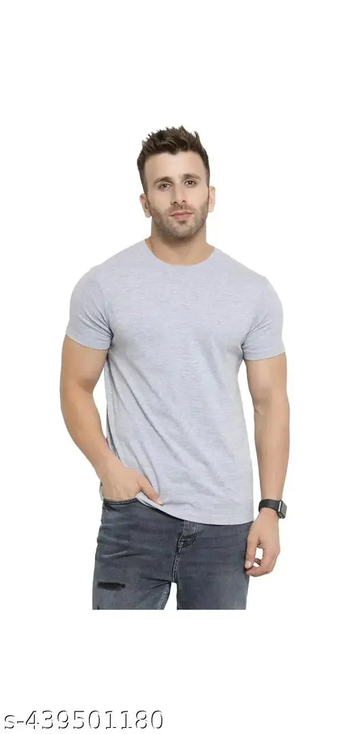 Grey Melange cotton blend men's short sleeves T-shirt, comfortable and loose fitting for casual outings. Perfect for summer wear, this solid color top features double needle stitching throughout for durability. Men's fashionable grey melange T-shirt. Made in India