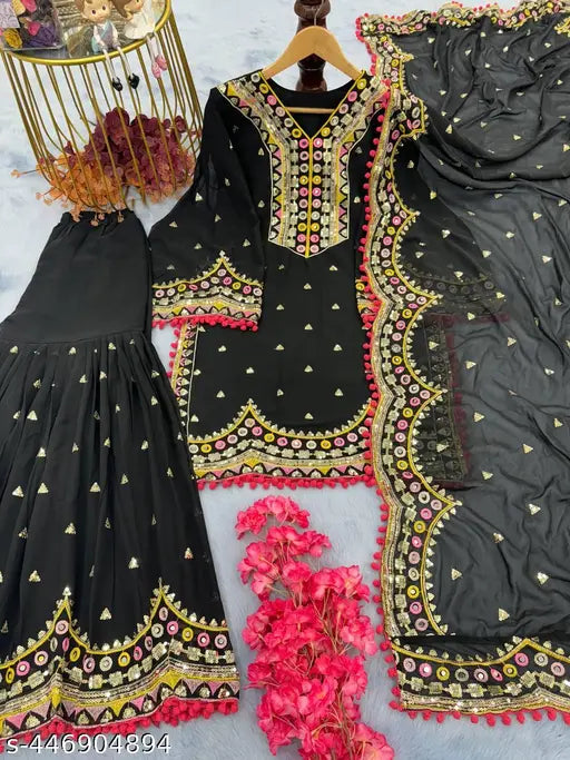 Black and gold bridal outfit with dupatta set, intricate embroidery details