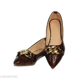Dark brown crocodile skin flat shoes with gold-colored buckles, featuring a low block heel