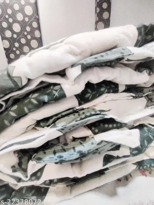 Green and white Jaipuri single quilt