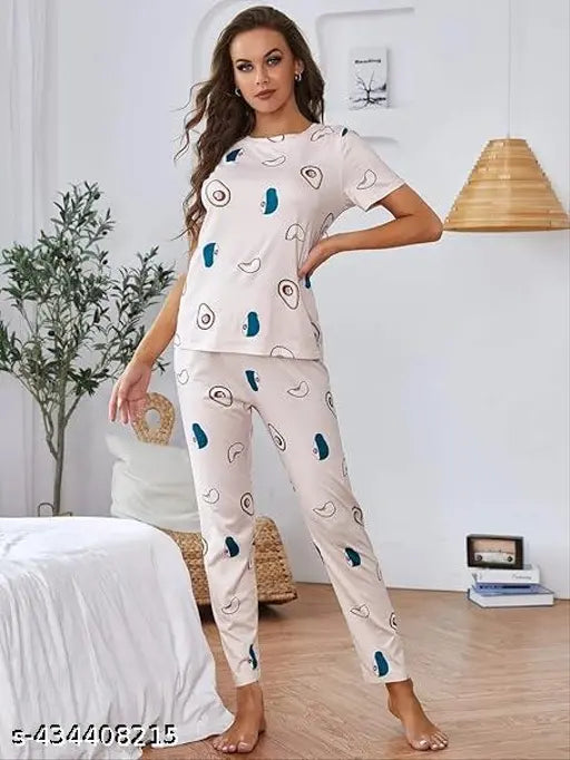 Luxurious women's satin night suit with avocado print, featuring premium cotton blend and loose-fitting design for ultimate comfort at home. Size range: S (30-28-30, 36), M (32-28-36), L (34-28-36), XL (36-13-36), XXL (38-30-38), Free Size (28-28-36). Perfect for gifting. Made in India