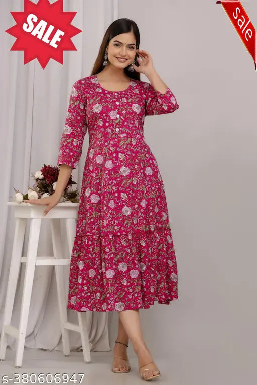 Pink cotton long kurta dress with embroidered details and flared sleeves