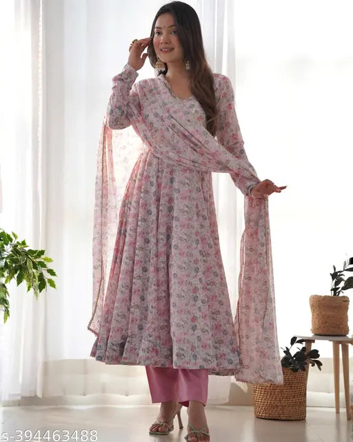 Traditional pink anarkali dance outfit, chiffon Chhath Puja dress with floral print & fancy neck design, padded churidar sleeves