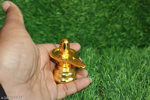Gold metal handmade Shivling idol statue for home decor, Pooja accessories, or car dashboard. Dimensions: 5.5x5.5 cm. Indian artisanal craftsmanship