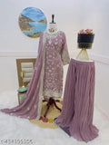 Heavy wedding gown with fringe and tassel details, intricate beadwork, long sleeves, flared skirt, floor-length fabric, worn over a shimmering dupatta