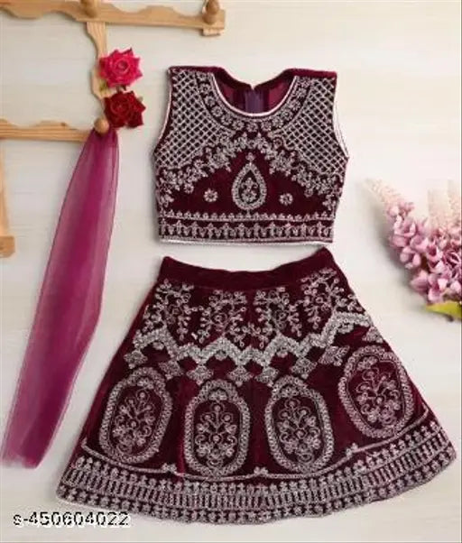 Taffeta silk embroidered lahanga choli for kids, sizes 12-8 years, Indian traditional attire on display