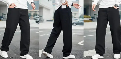 Men's black baggy loose fit cotton blend jeans, solid net style for modern and stylish fits. Relaxed design with stretchable fabric, perfect for casual or streetwear. Available in sizes 28 (29 waist, 41 length, 39 hip) and 34 (35 waist, 41 length, 45 hip). Origin: India
