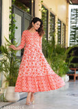 Vibrant orange rayon kurtis with embroidered yoke, tassels, and multi-colored print. Sleeve length: three-quarter. India origin