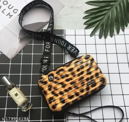 Animal print sling bag with detachable side bag
