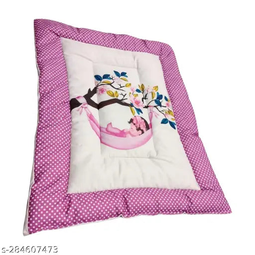Pink and white polka dot baby nursery bed with New Born Baby sleeping on it, cotton bedding