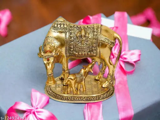 Golden hand-painted Kamdhenu Cow statue with calf, Indian export quality polyresin figure (20cm x 9cm x 15cm)