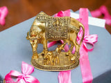 Golden hand-painted Kamdhenu Cow statue with calf, Indian export quality polyresin figure (20cm x 9cm x 15cm)