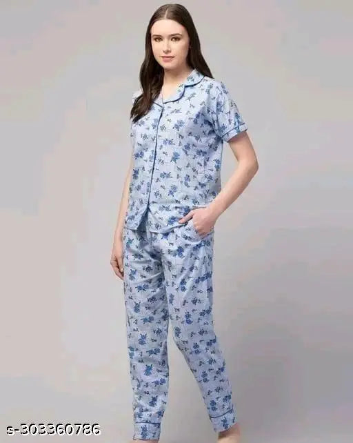 Stylish printed cotton night suits, short-sleeved pyjamas set with vibrant patterns. Available in S, M, L, XL, XXL sizes. Indian origin