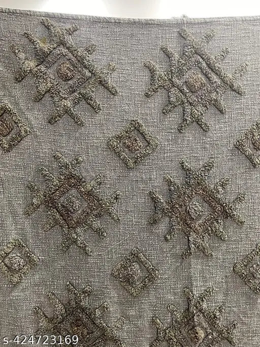 Stone washed slub cotton tufted throw, with blue and white tones