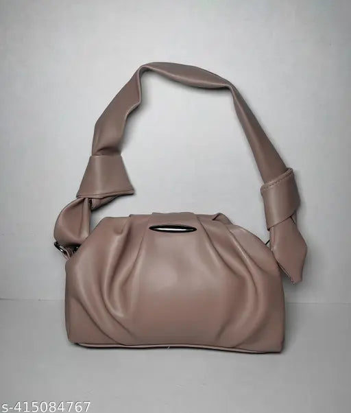 Pink leather sling bag with a strap, for women