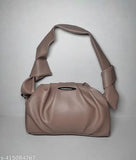 Pink leather sling bag with a strap, for women