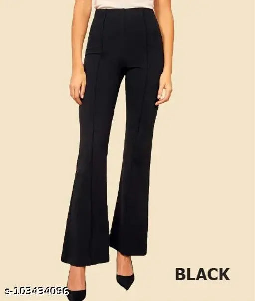 High-waisted black pants with cropped length and flared legs