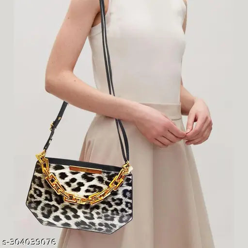 Trendy sling bag with animal print, black chain strap, and gold hardware