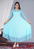 Teal flared rayon kurta with printed design and three-quarter sleeves, perfect for women's ethnic wear