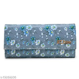 Grey floral embroidery wallet with closure, large enough for bills and cards