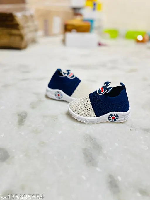 Kid's style blue and navy casual sneakers with white soles