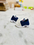 Kid's style blue and navy casual sneakers with white soles