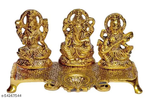 Golden metal idol of Ganesha, Lakshmi, and Saraswati from India, ornamental figurines each approximately 10cm tall and 20cm wide