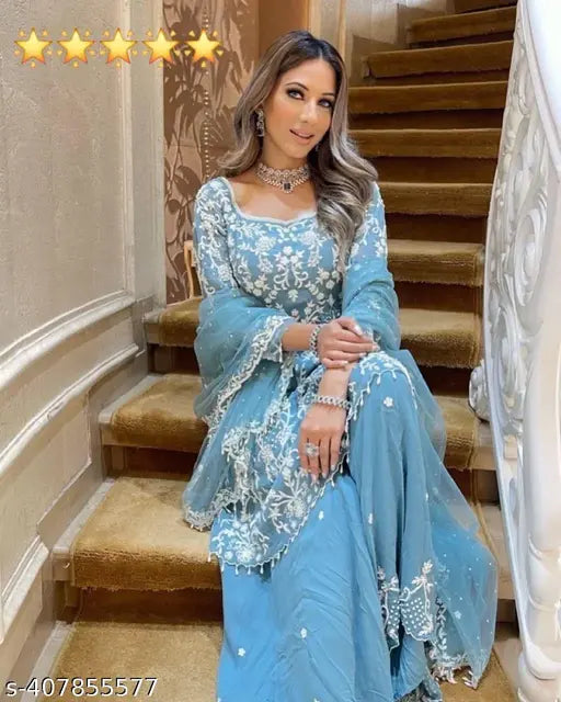 Blue faux georgette designer top with heavy fabric, palazzo suit, embellished neckline
