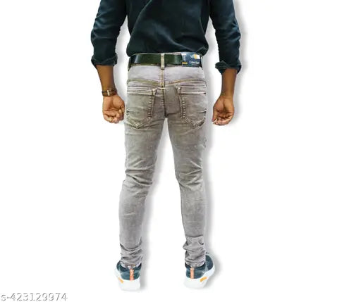 A person wearing light blue jeans