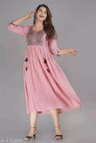 Pink rayon below-knee gown with embroidered front panel, sleeve borders, and side tassels