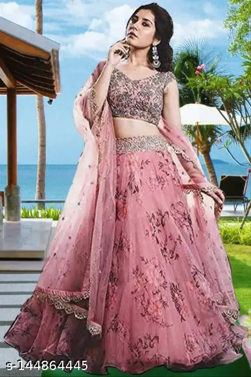 Embroidered pink semi-stitched lehenga choli set on mannequin, net fabric with intricate Indian embroidery