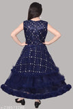 Blue satin dress with ruffle detailing and fringe accents
