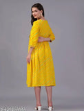 Yellow long kameez with horizontal stripes on a model