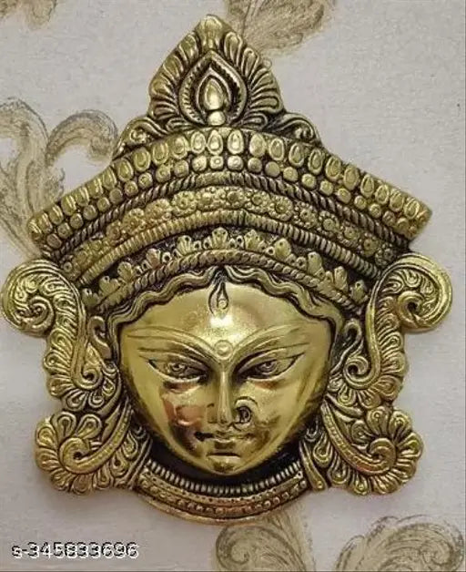 Metal Durga Mata face idol wall hanging, handcrafted for good luck, success, and prosperity. Durga Murti, 15cm x 17cm, celebrating feminine 'Shakti
