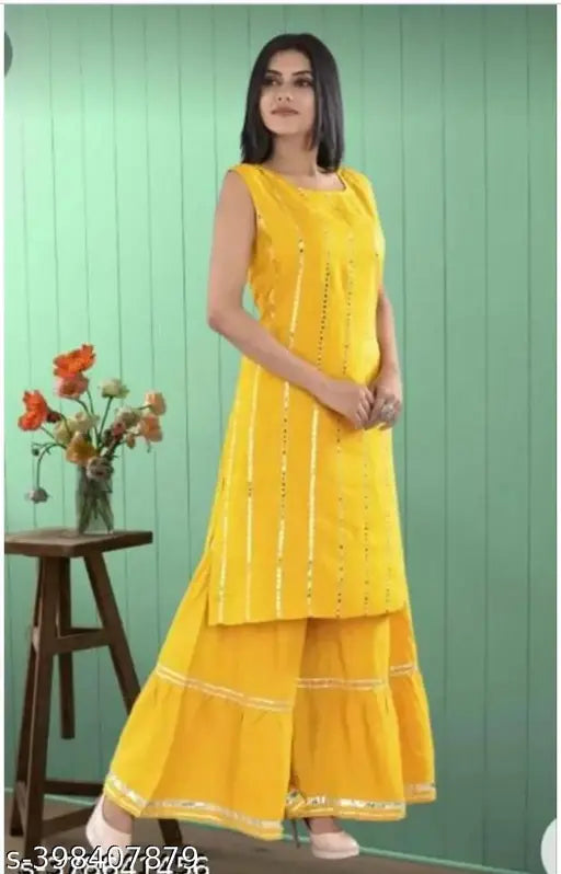 Yellow rayon sleeveless kurta with sharara bottomwear for women, solid net design by T R Creation, perfect for important ethnic events