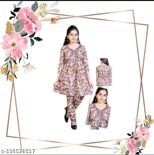 Bright, printed Aliya Coord set: Anarkali top with three-quarter sleeves and matching pyjamas in Rayon Cotton. Heavy embroidery, tassels, fancy buttons, backside chain, and floral print. Indo-western fusion wear for 4-9 years old kids. Made in India