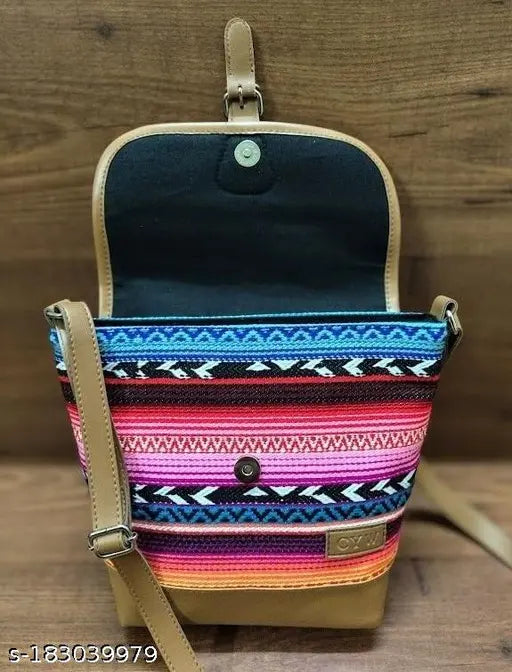 Multicolored crossbody bag with a shoulder strap, suitable for women and girls. Adjustable length strap, likely made of fabric or leather
