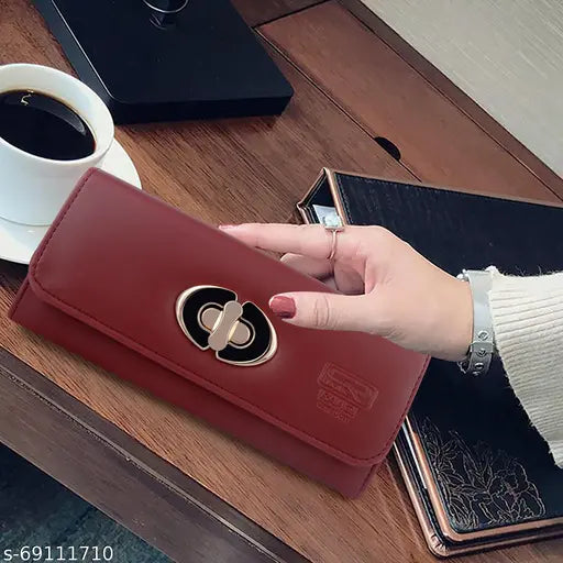 Brown clutch bag with a twist lock closure and multiple card slots, for women