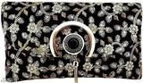 Floral pattern, beaded edges, small gold clasp