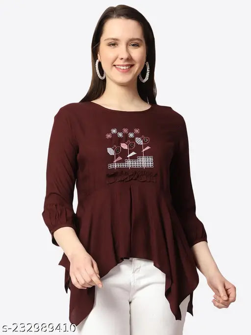 Maroon rayon boat neck ethnic motif tunic top, embroidered net pattern on three-quarter sleeves