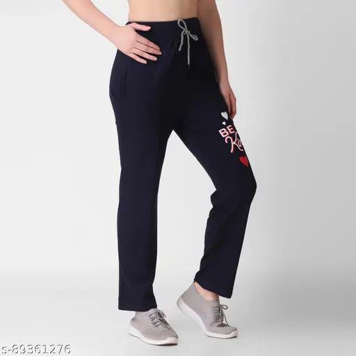 Black cotton sweatpants with a white heart logo
