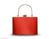 Red fabric clutch purse with gold accents and flap closure