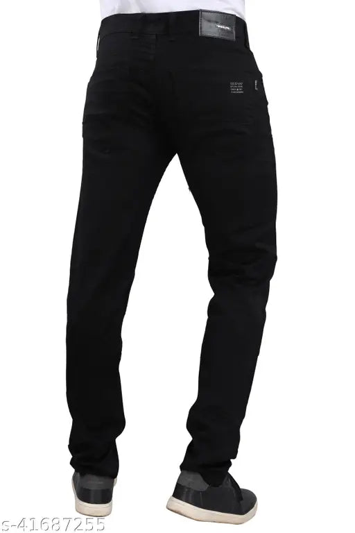Black denim jeans for men by SEGVAY. Solid pattern, rock n roll wardrobe staple, versatile fit and length options, India origin