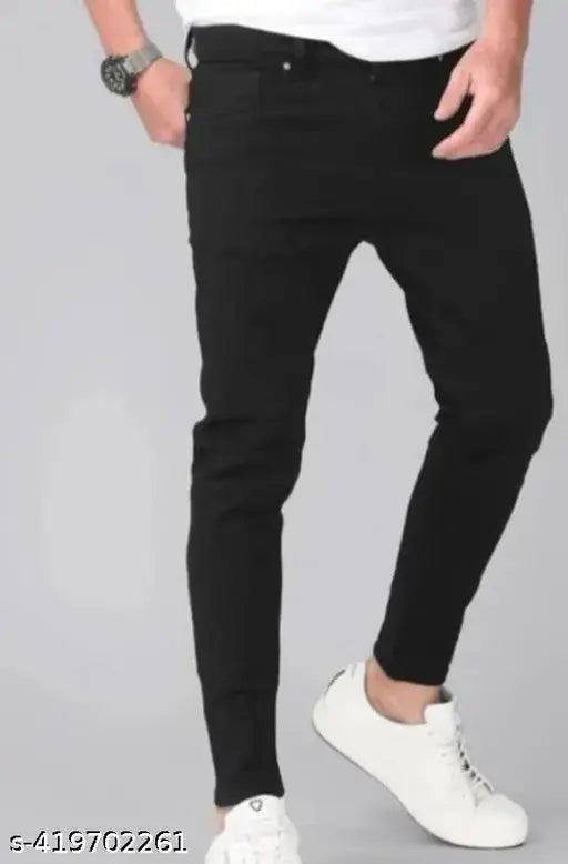 Black cotton denim jeans for men, trendy solid-pattern style with a high-quality fit, size 28, 30, or 32 from India