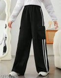 Plazzo set for women. Black pants with white stripes, black sweatshirt with hoodie and drawstring inset