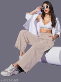 Tan cotton cargo pants, sleeveless cropped top, side pockets